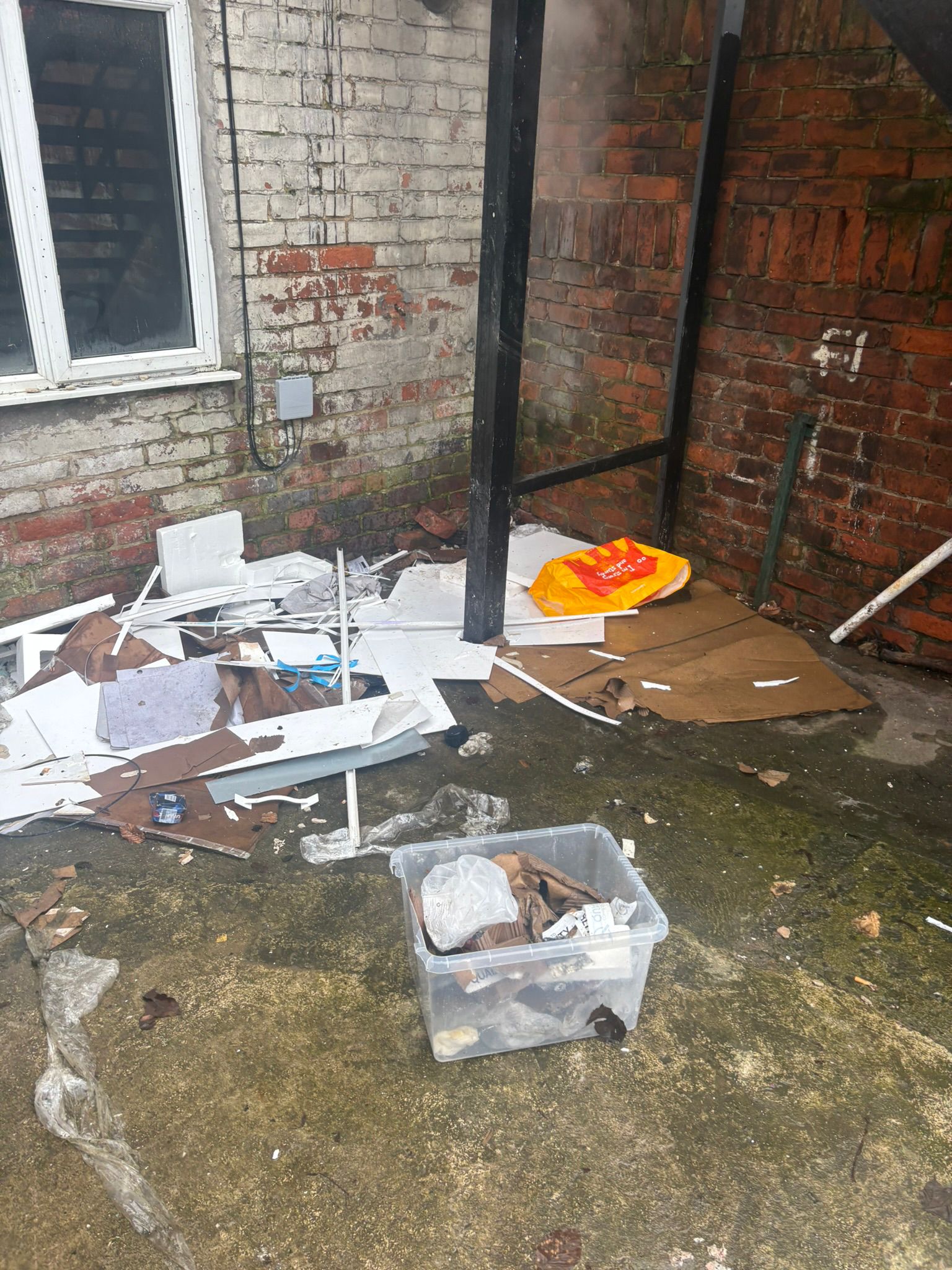 Close view of the same yard after debris removal